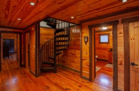 The River's Edge | Cabin Rentals of Georgia | Upstairs Floor Area with Spiral Staircase Leading to Loft