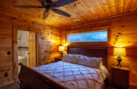 Riverview Lodge | Cabin Rentals of Georgia | Terrace Level King Suite with fireplace and TV and private ensuite bath