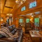 ConversationalSeatinginLivingAreawithSmartTV,WoodFireplace,andDiningArea