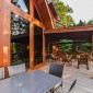 ContinuetheConversationAroundtheWrap-aroundPorchwithAnotherTablefor6