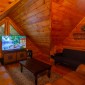 LoftSittingAreawithLeatherSeating,SMARTTV,andFuton